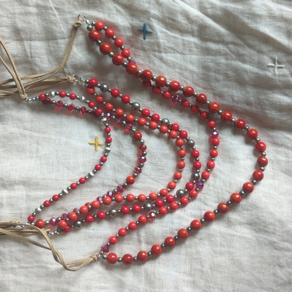 Red beaded necklace with faux leather chain